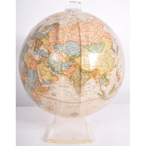 296 - George F Cram Company - A 20th Century American desk top globe raised a one piece moulded Perspex st... 