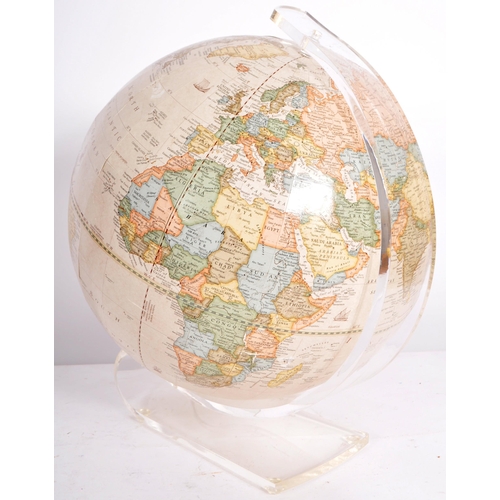 296 - George F Cram Company - A 20th Century American desk top globe raised a one piece moulded Perspex st... 