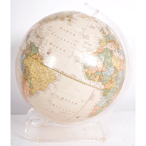 296 - George F Cram Company - A 20th Century American desk top globe raised a one piece moulded Perspex st... 