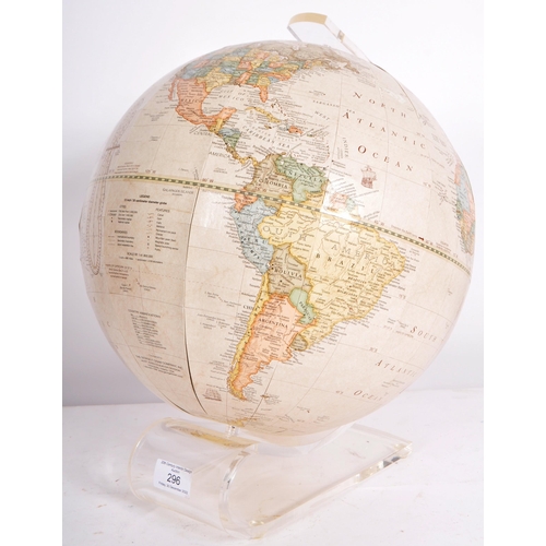 296 - George F Cram Company - A 20th Century American desk top globe raised a one piece moulded Perspex st... 