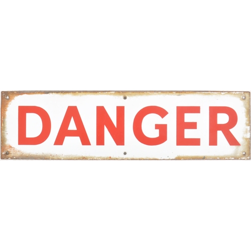 297 - A vintage 20th Century danger porcelain enamel sign having red lettering on white ground. Measures a... 