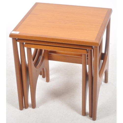 298 - Stonehill - A retro mid 20th Century 1960s teak nest of three tables. The graduating nest having cha... 