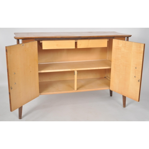 322 - Everest - Helix - A retro mid 20th Century teak and walnut sideboard credenza having a shaped top wi... 