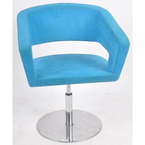 328 - A Contemporary designer swivel office chair / lobby chair armchair having a shaped arm and backrest ... 