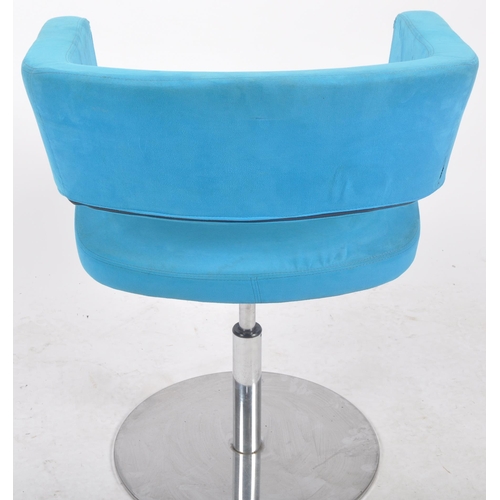 328 - A Contemporary designer swivel office chair / lobby chair armchair having a shaped arm and backrest ... 