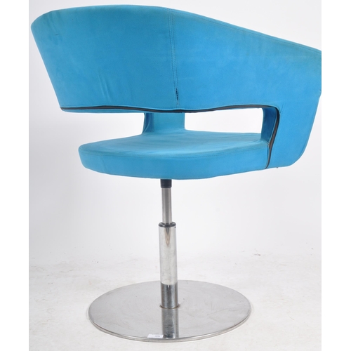 328 - A Contemporary designer swivel office chair / lobby chair armchair having a shaped arm and backrest ... 