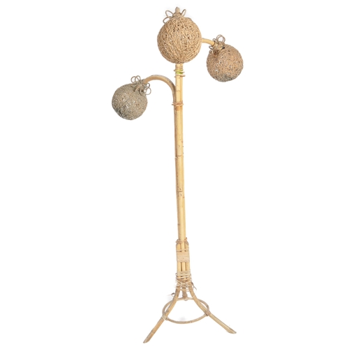 334 - A retro mid 20th Century bamboo three branch lamp standard having three bamboo arms with hanging spu... 