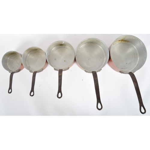 343 - A matching set five vintage 20th Century French copper saucepans of typical form each having wrought... 