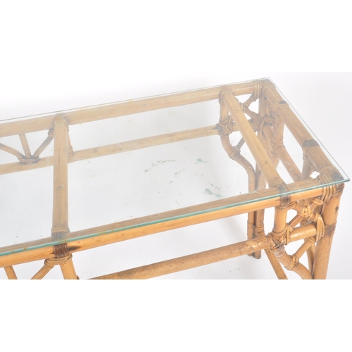 35 - A retro vintage 20th Century bamboo console / hall table of elongated form having a clear glass top ... 