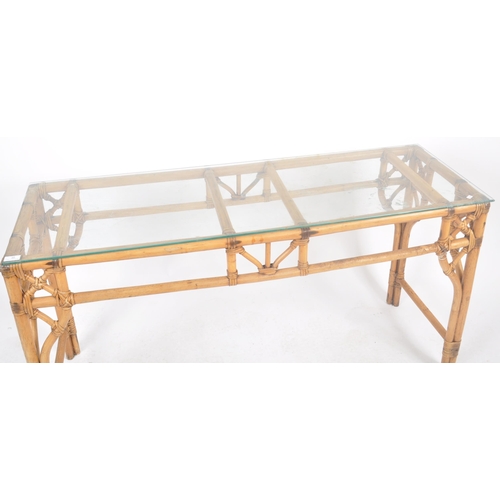 35 - A retro vintage 20th Century bamboo console / hall table of elongated form having a clear glass top ... 