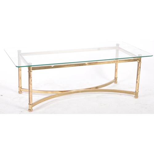 368 - A 20th Century 1980s Hollywood Regency brass framed coffee table / low table of rectangular form hav... 