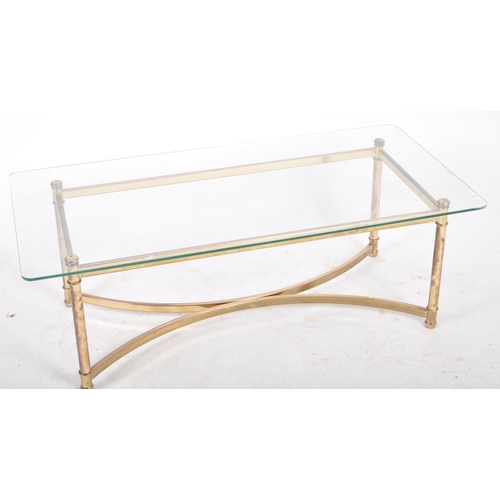 368 - A 20th Century 1980s Hollywood Regency brass framed coffee table / low table of rectangular form hav... 