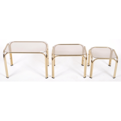 378 - A retro 20th Century 1980s Hollywood Regency brass framed nest of tables / occasional tables. The gr... 