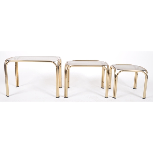 378 - A retro 20th Century 1980s Hollywood Regency brass framed nest of tables / occasional tables. The gr... 