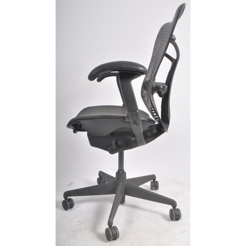 39 - Studio 7.5 - Herman Miller - Mirra 2 - A retro late 20th Century swivel desk office chair having adj... 