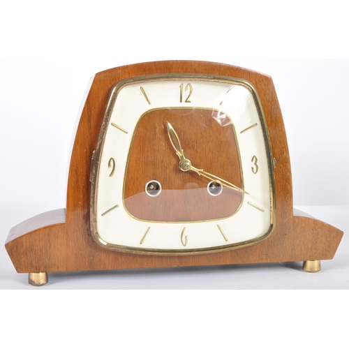 394 - A retro vintage 20th Century Art Deco walnut cased mantel clock having a white painted chapter ring ... 