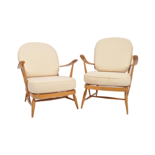 395 - Lucian Ercolani - Ercol - Model 334 - A pair of retro vintage 1960s beech and elm armchairs / easy l... 