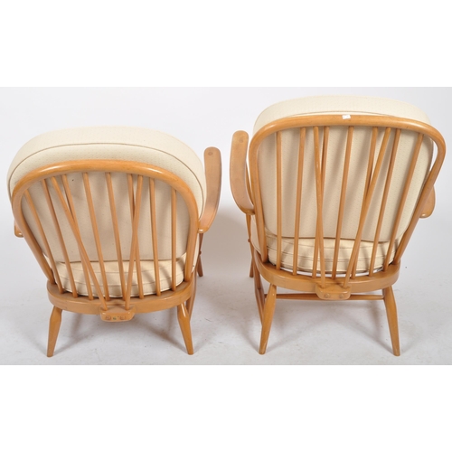 395 - Lucian Ercolani - Ercol - Model 334 - A pair of retro vintage 1960s beech and elm armchairs / easy l... 