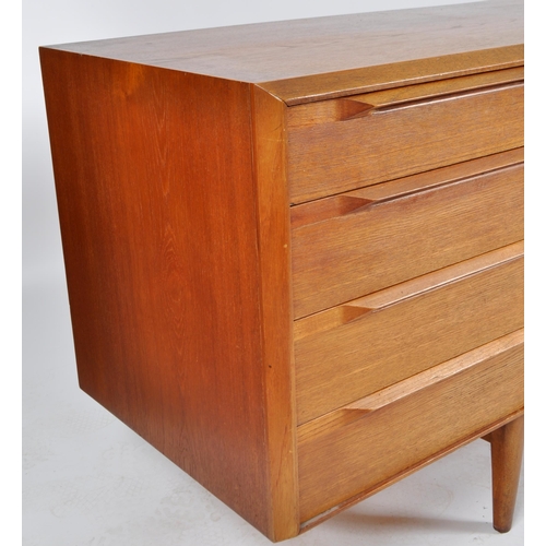 402 - A. H. Mcintosh & Co - A retro 20th Century teak sideboard credenza having a bank of four graduating ... 