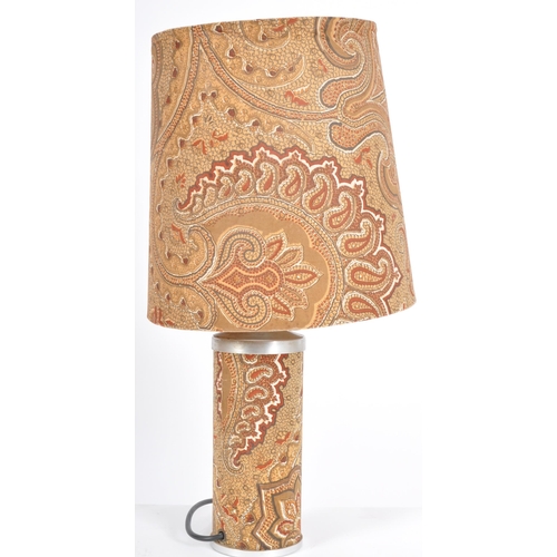 404 - A retro 20th Century 1970s Paisley design table lamp light having a barrel shade and cylindrical lam... 