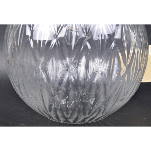 411 - A retro vintage mid 20th Century Danish glass ball lamp ceiling light of globe form. Clear glass wit... 