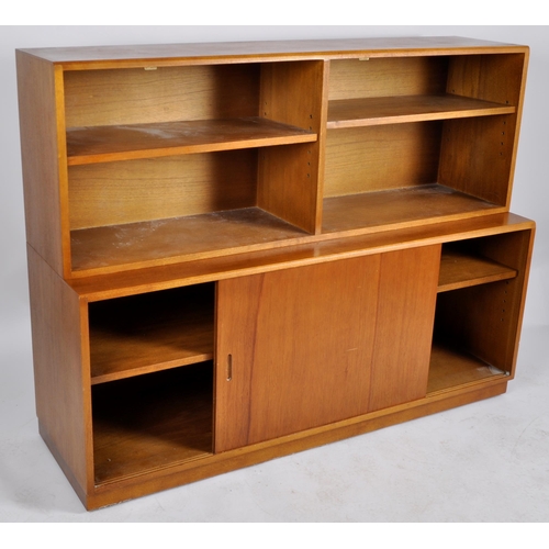 414 - Simplex - A retro 20th Century two part bookcase cabinet having an open bookcase top with adjustable... 