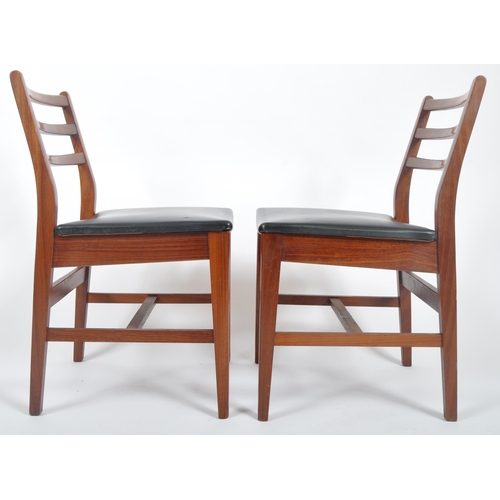 418 - A matching set of four retro 20th Century teak framed ladderback dining chairs with each having thre... 