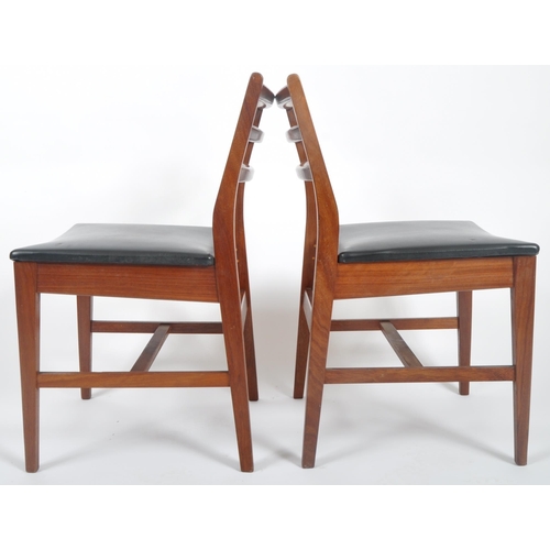 418 - A matching set of four retro 20th Century teak framed ladderback dining chairs with each having thre... 