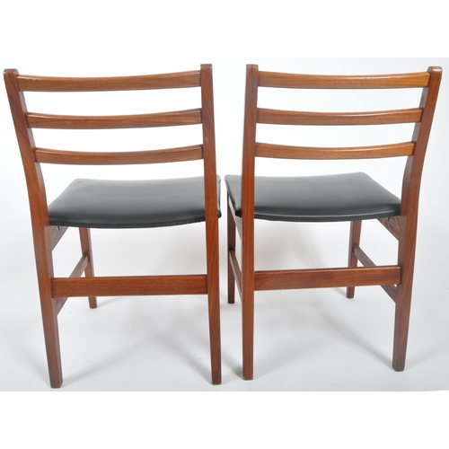 418 - A matching set of four retro 20th Century teak framed ladderback dining chairs with each having thre... 