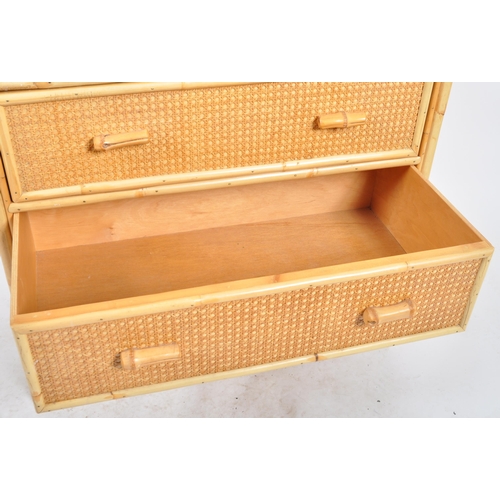 427 - A retro vintage mid 20th Century 1970s bamboo & rattan chest of drawers. The chest having a gallery ... 