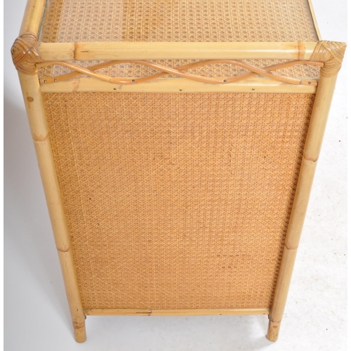 427 - A retro vintage mid 20th Century 1970s bamboo & rattan chest of drawers. The chest having a gallery ... 