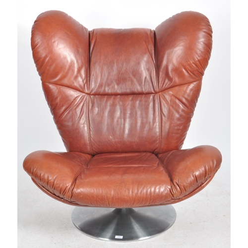 430 - A Contemporary designer swivel chair / easy lounge chair in the Mastermind taste with padded seat an... 