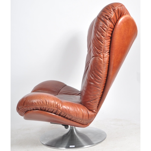 430 - A Contemporary designer swivel chair / easy lounge chair in the Mastermind taste with padded seat an... 