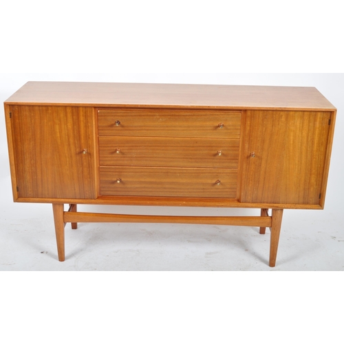 435 - Gordon Russell - A retro mid 20th Century teak sideboard credenza having a central bank of three dra... 