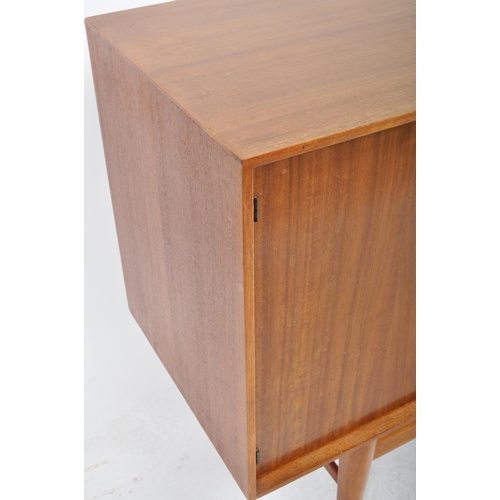 435 - Gordon Russell - A retro mid 20th Century teak sideboard credenza having a central bank of three dra... 