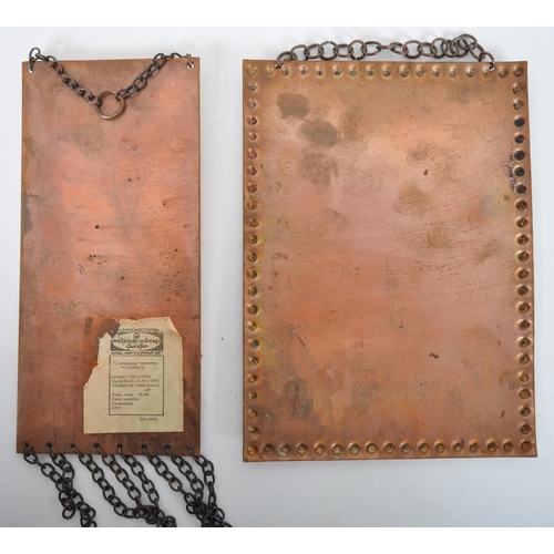 443 - Two retro 20th Century 1970s enameled copper wall plaques with one depicting a gatehouse and the oth... 