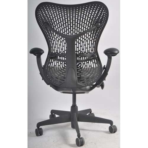 445 - Studio 7.5 - Herman Miller - Mirra 2 - A retro late 20th Century swivel desk office chair having adj... 