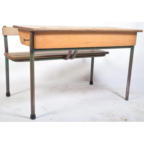 452 - A matching pair of retro vintage mid 20th Century French school desk benches with each comprising of... 