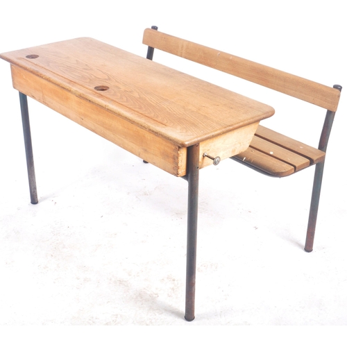 452 - A matching pair of retro vintage mid 20th Century French school desk benches with each comprising of... 