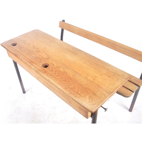 452 - A matching pair of retro vintage mid 20th Century French school desk benches with each comprising of... 