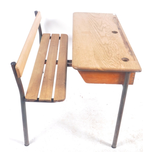 452 - A matching pair of retro vintage mid 20th Century French school desk benches with each comprising of... 