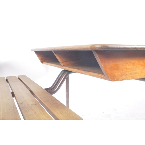 452 - A matching pair of retro vintage mid 20th Century French school desk benches with each comprising of... 