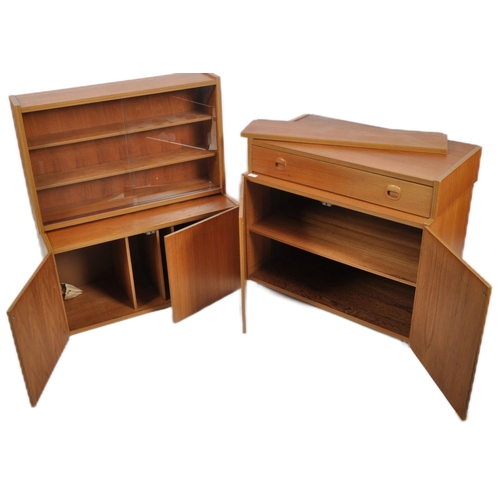 454 - British Modern Furniture – A mid 20th Century teak wood modular cabinet / wall unit having twin door... 