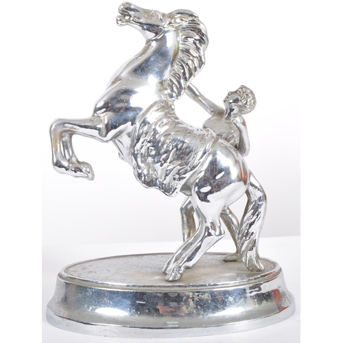 456 - A vintage 20th Century Art Deco chrome plated Marley Horse and Tamer figure group of typical form ra... 