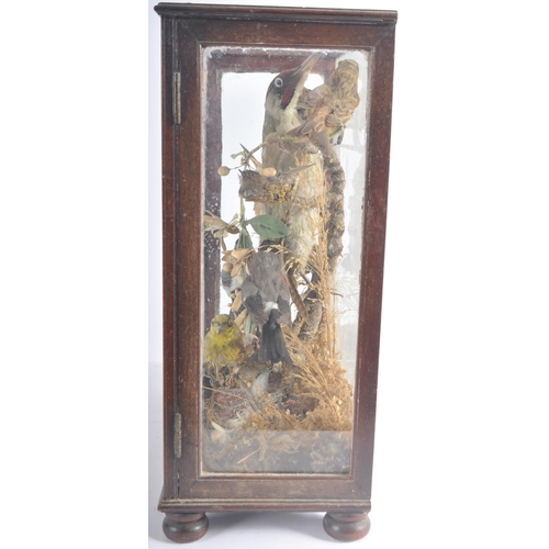 457 - Taxidermy & Natural History - A late 20th Century Victorian taxidermy display case housing various b... 