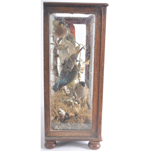 457 - Taxidermy & Natural History - A late 20th Century Victorian taxidermy display case housing various b... 