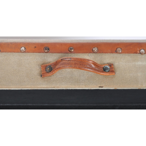 46 - A contemporary revival Polo trunk having a hinged padded top with studded leather surround. Marked '... 