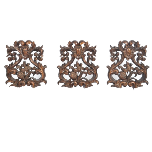 476 - A matching set of three Contemporary carved interior features / displays with each foliate and scrol... 