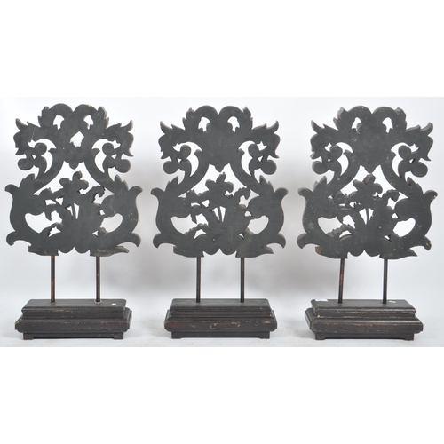 476 - A matching set of three Contemporary carved interior features / displays with each foliate and scrol... 