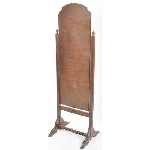 482 - An early 20th Century full length oak cheval dressing mirror having a single bevelled edge mirror pl... 